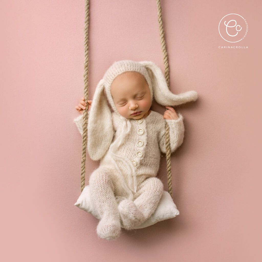 Sleeping Newborn baby on a swing - Best Time For Newborn Photos